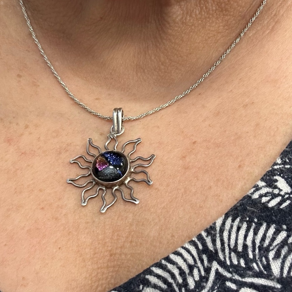 Silver Sun Pendant Necklace iridescent, blues, and greens. Statement piece.